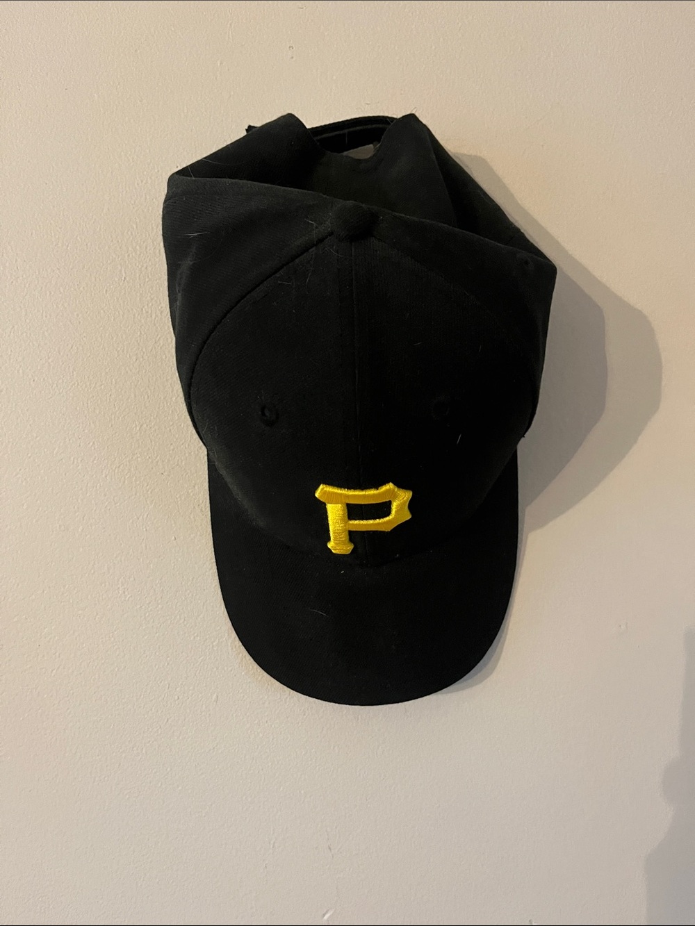 New Era Pirates Black Cap with Yellow 'P' Logo